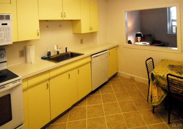 606 West Broad Street, Unit F Bethlehem, PA 18018 - Photo 6 of 16 The kitchen looks into the living room and receive