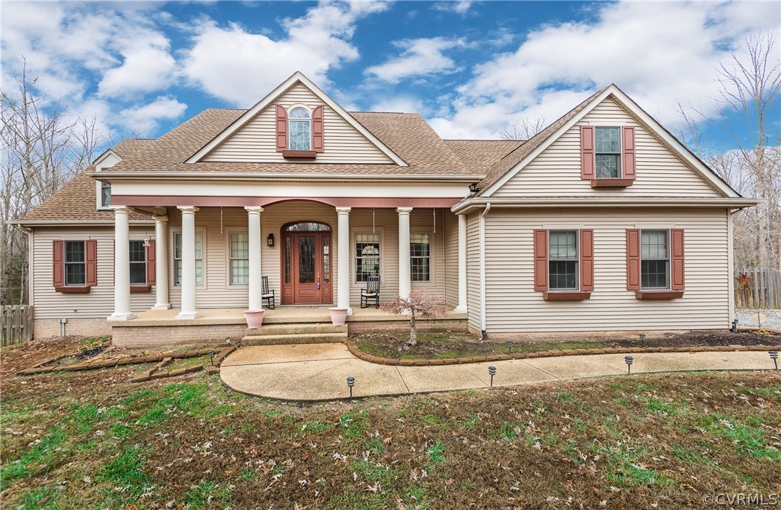 front view of a house with a yard