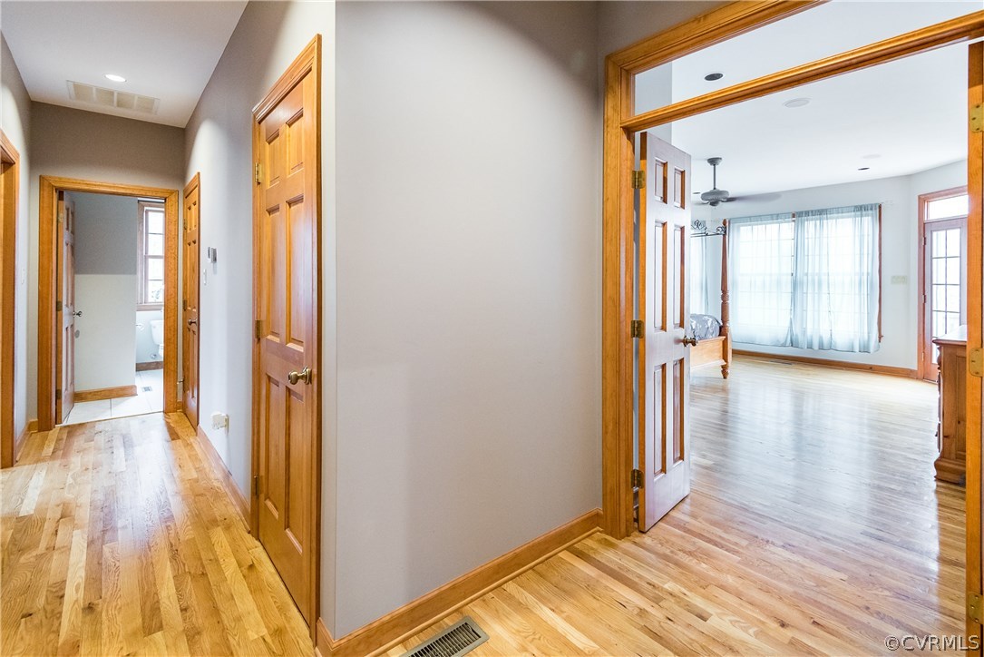 11300 Taylor Road Chesterfield, VA 23838 - Photo 17 of 39 a view of a hallway with wooden floor and staircase