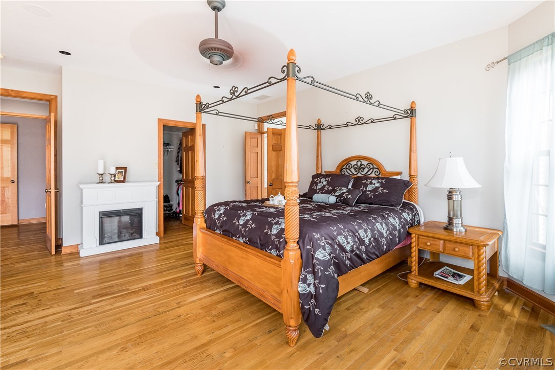 11300 Taylor Road Chesterfield, VA 23838 - Photo 19 of 39 a spacious bedroom with a bed window and a table