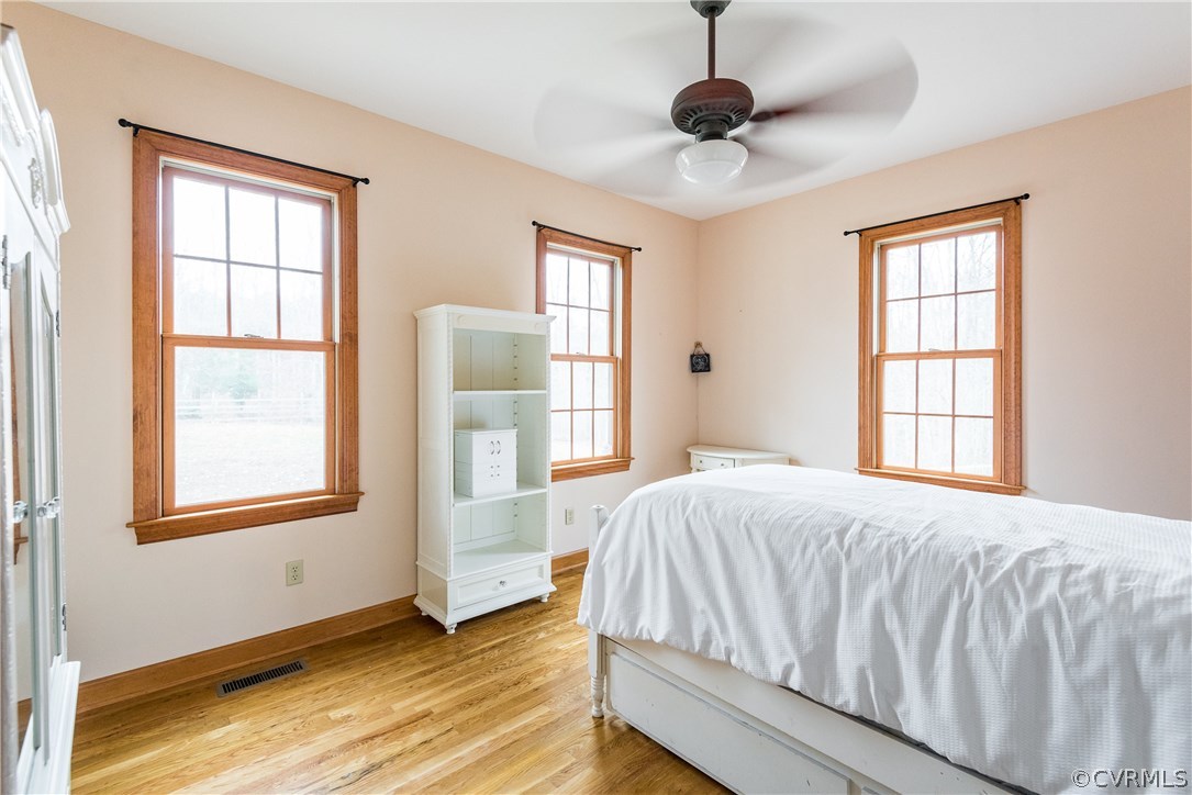 11300 Taylor Road Chesterfield, VA 23838 - Photo 22 of 39 a bedroom with a bed and a window