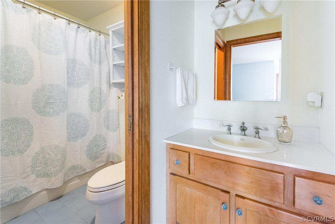 11300 Taylor Road Chesterfield, VA 23838 - Photo 25 of 39 a bathroom with a sink a toilet and shower