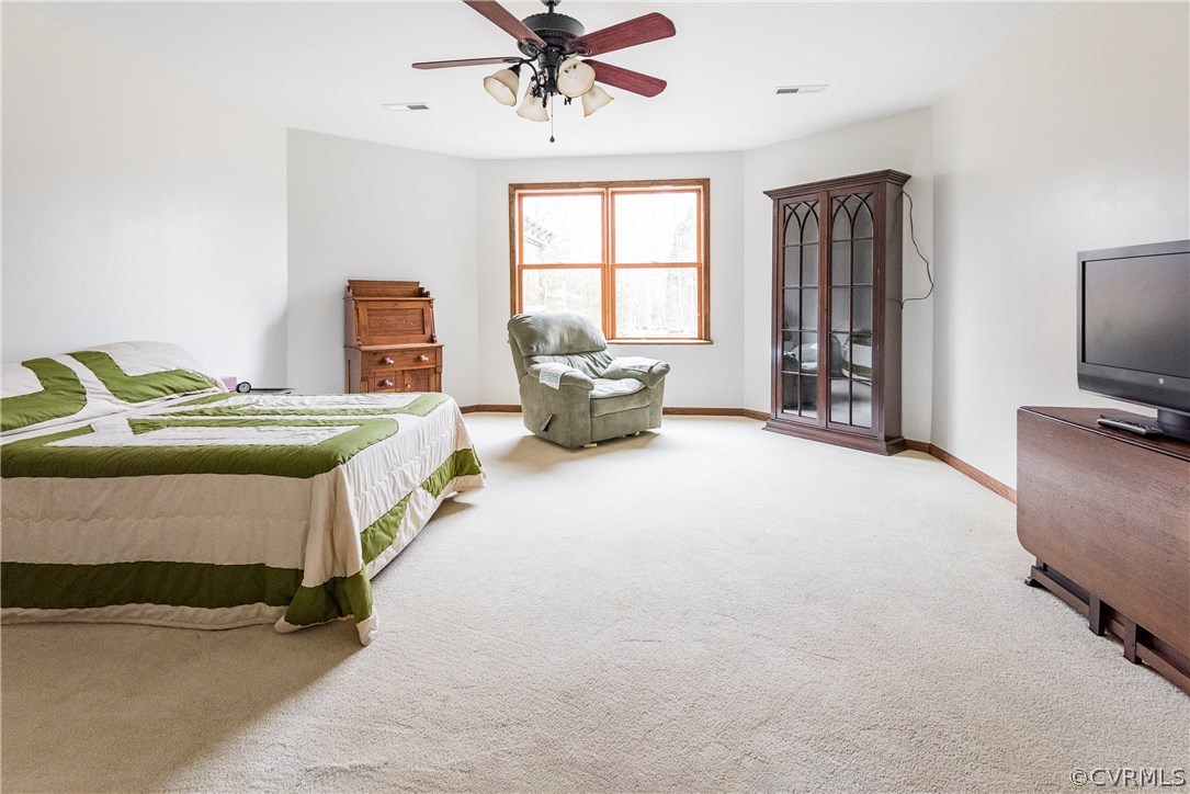 11300 Taylor Road Chesterfield, VA 23838 - Photo 31 of 39 a bedroom with furniture and a window