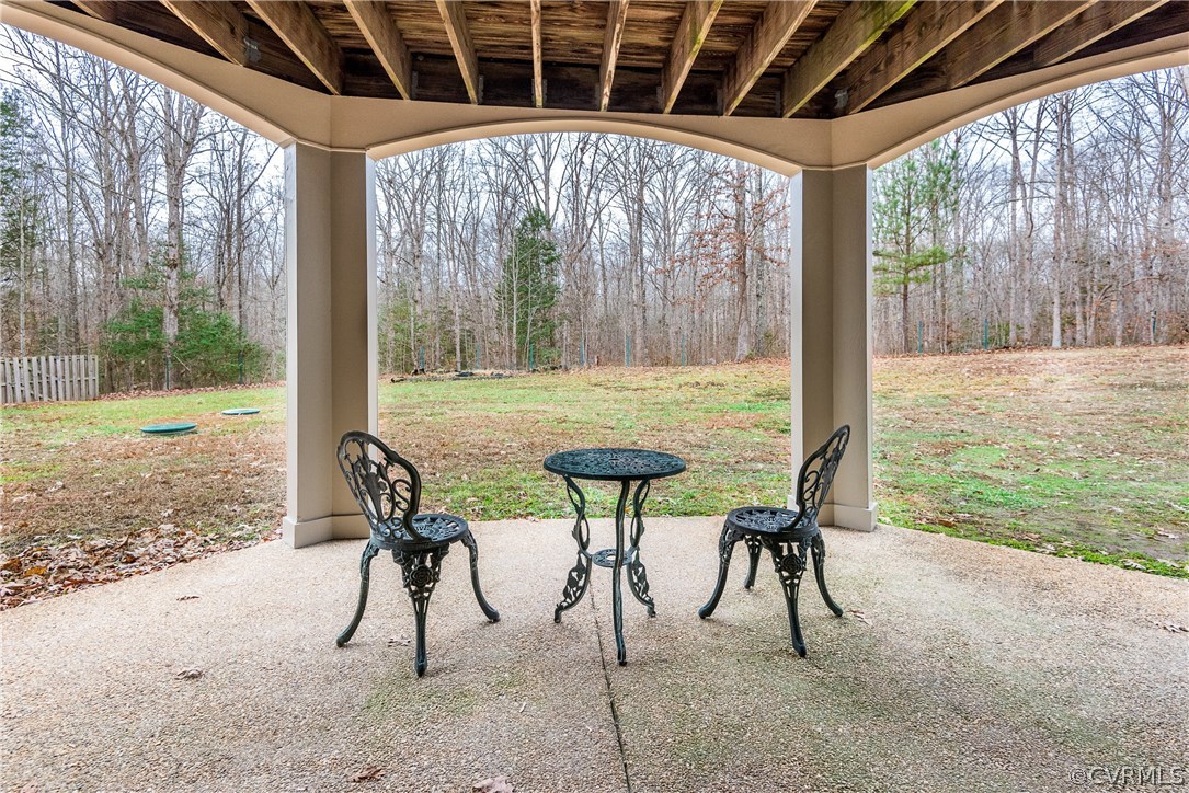 11300 Taylor Road Chesterfield, VA 23838 - Photo 34 of 39 a view of a patio with a table chairs and a yard
