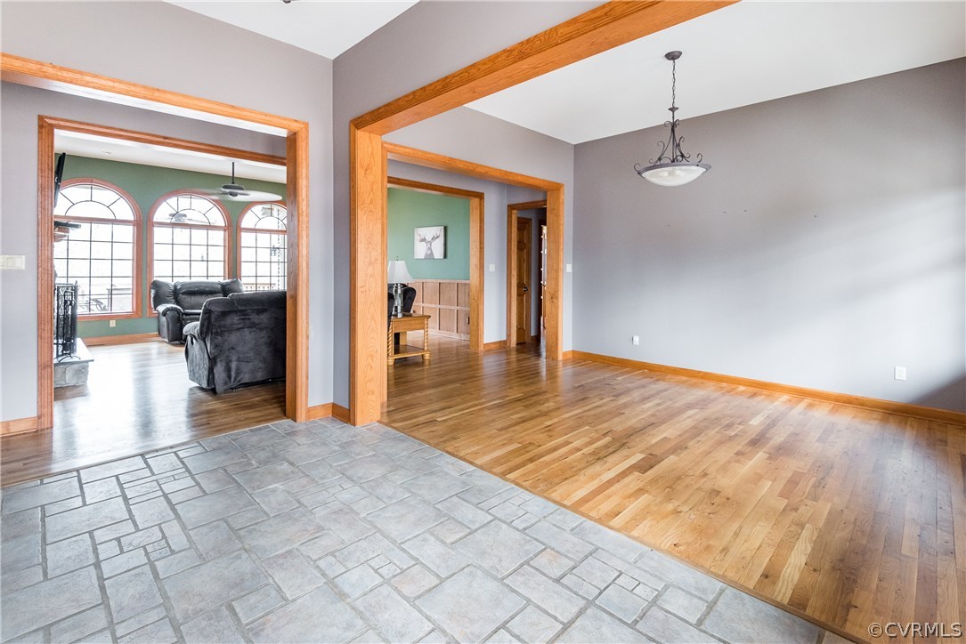 11300 Taylor Road Chesterfield, VA 23838 - Photo 6 of 39 a view interior of a house wooden floor and a chandelier