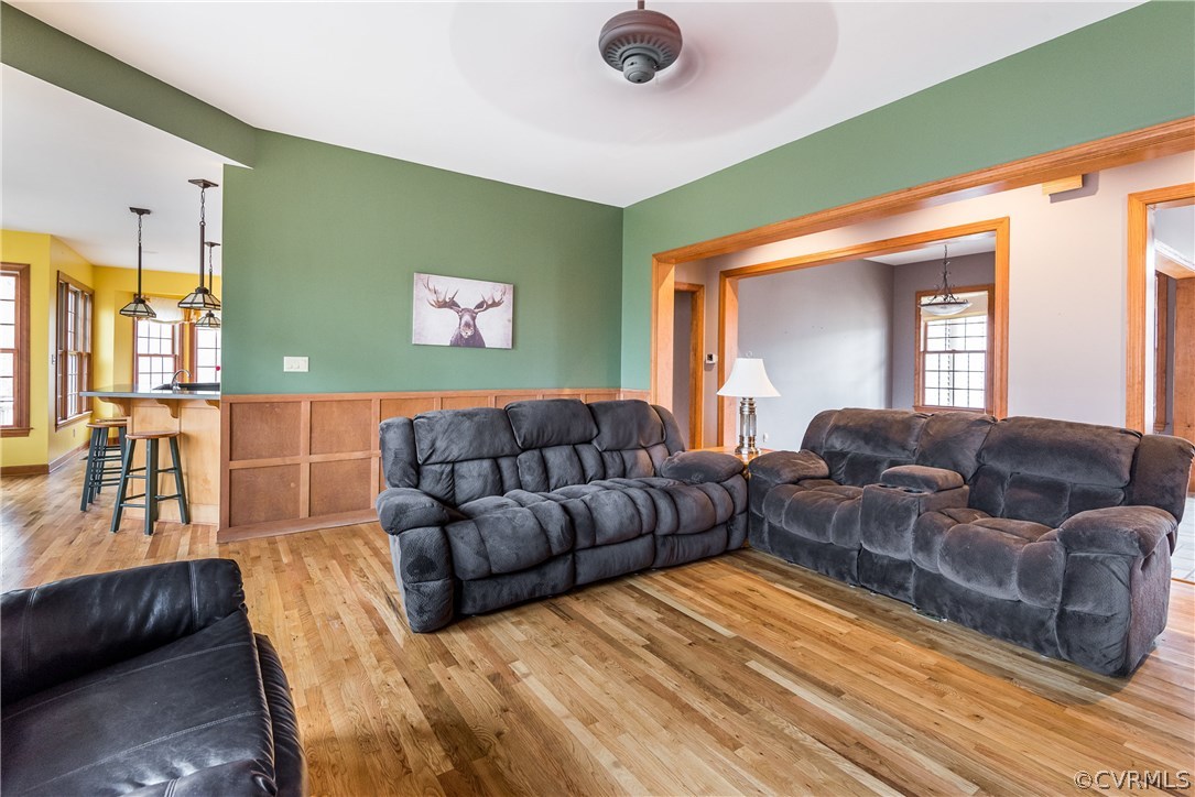 11300 Taylor Road Chesterfield, VA 23838 - Photo 8 of 39 a living room with a couch and a wooden floor