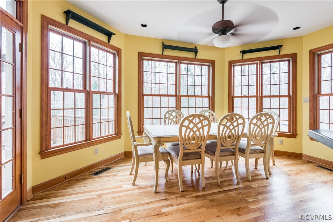 11300 Taylor Road Chesterfield, VA 23838 - Photo 9 of 39 a view of a dining room with furniture window and wooden floor