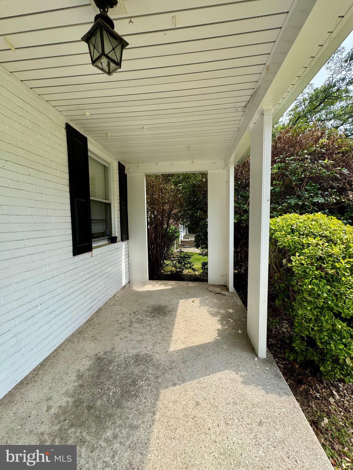 3913 Loch Raven Boulevard Baltimore, MD 21218 - Photo 4 of 38 a porch with seating space
