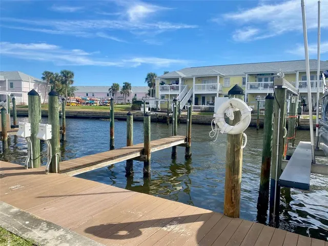 a view of a balcony and dining area
