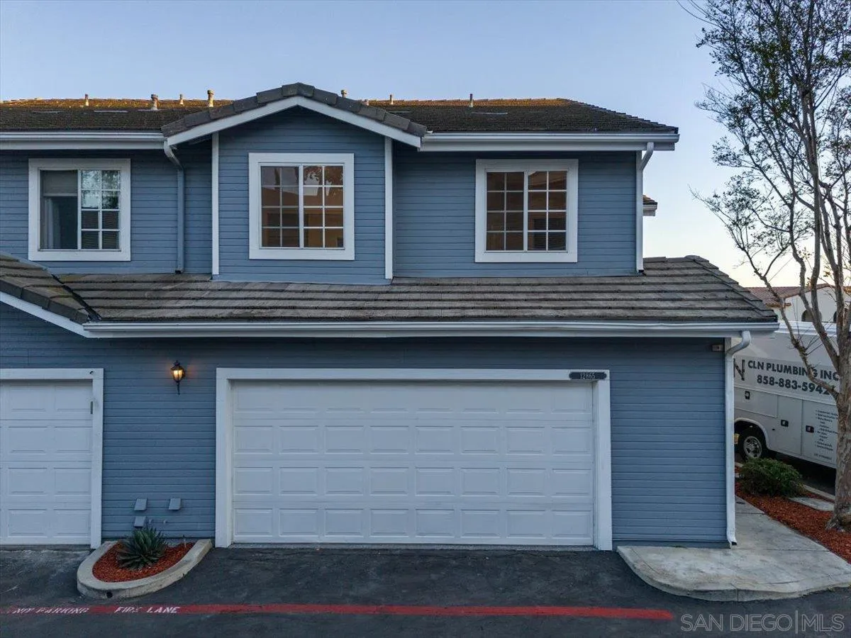 12865 Carriage Heights Way Poway, CA 92064 - Photo 2 of 42 a front view of a house with parking space