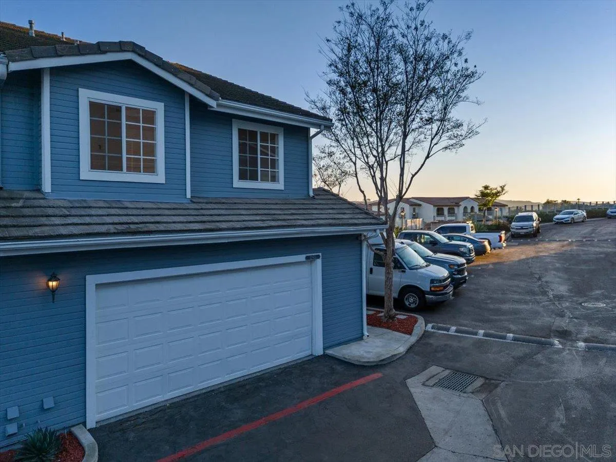 12865 Carriage Heights Way Poway, CA 92064 - Photo 3 of 42 a couple of cars parked in front of a house