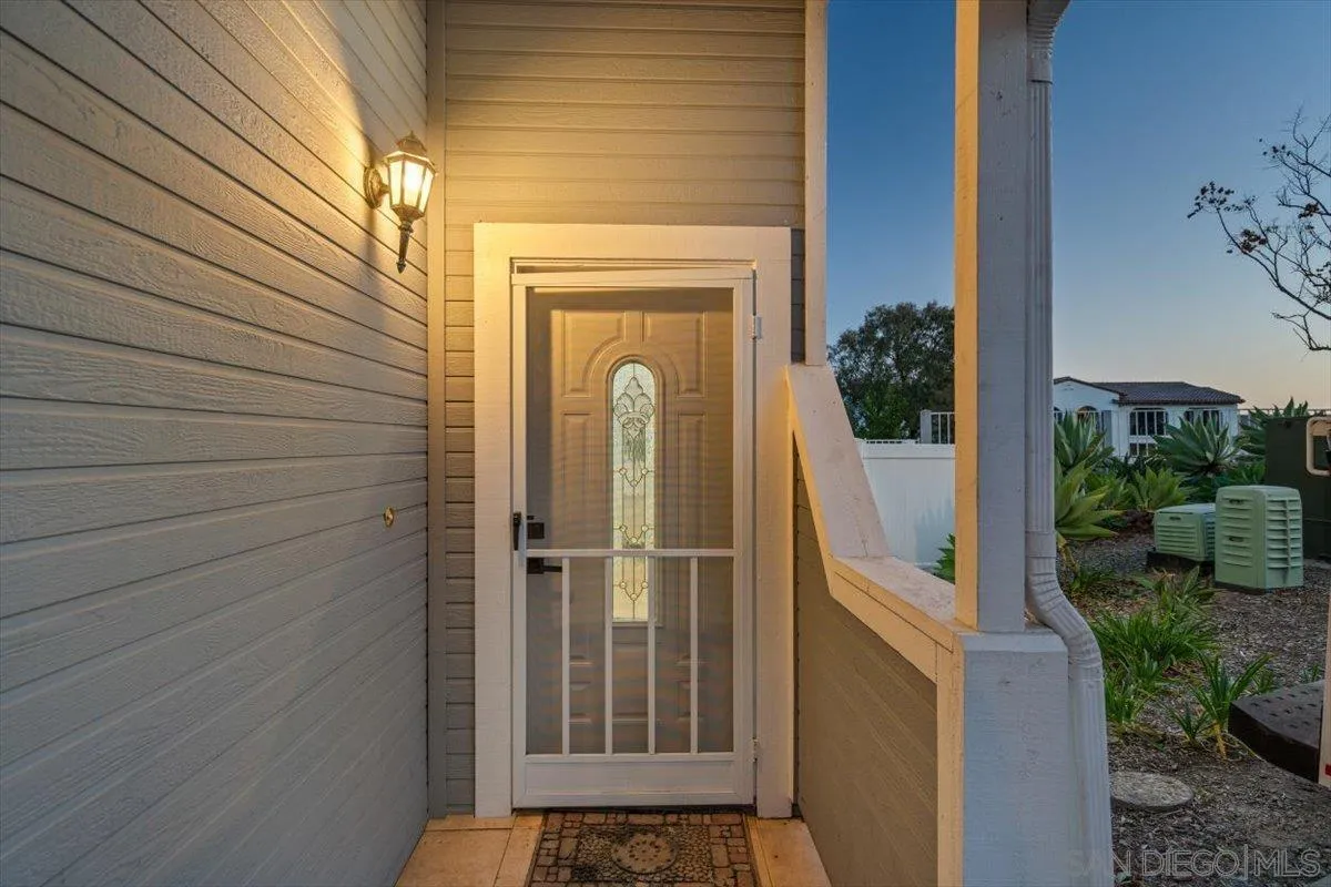 12865 Carriage Heights Way Poway, CA 92064 - Photo 5 of 42 a view of a door and a window