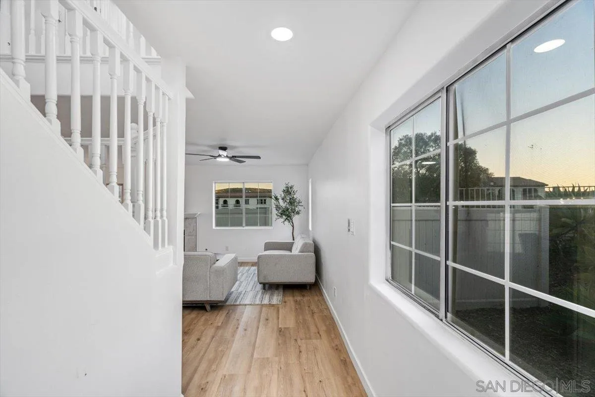 12865 Carriage Heights Way Poway, CA 92064 - Photo 6 of 42 a view of living room with furniture and wooden floor