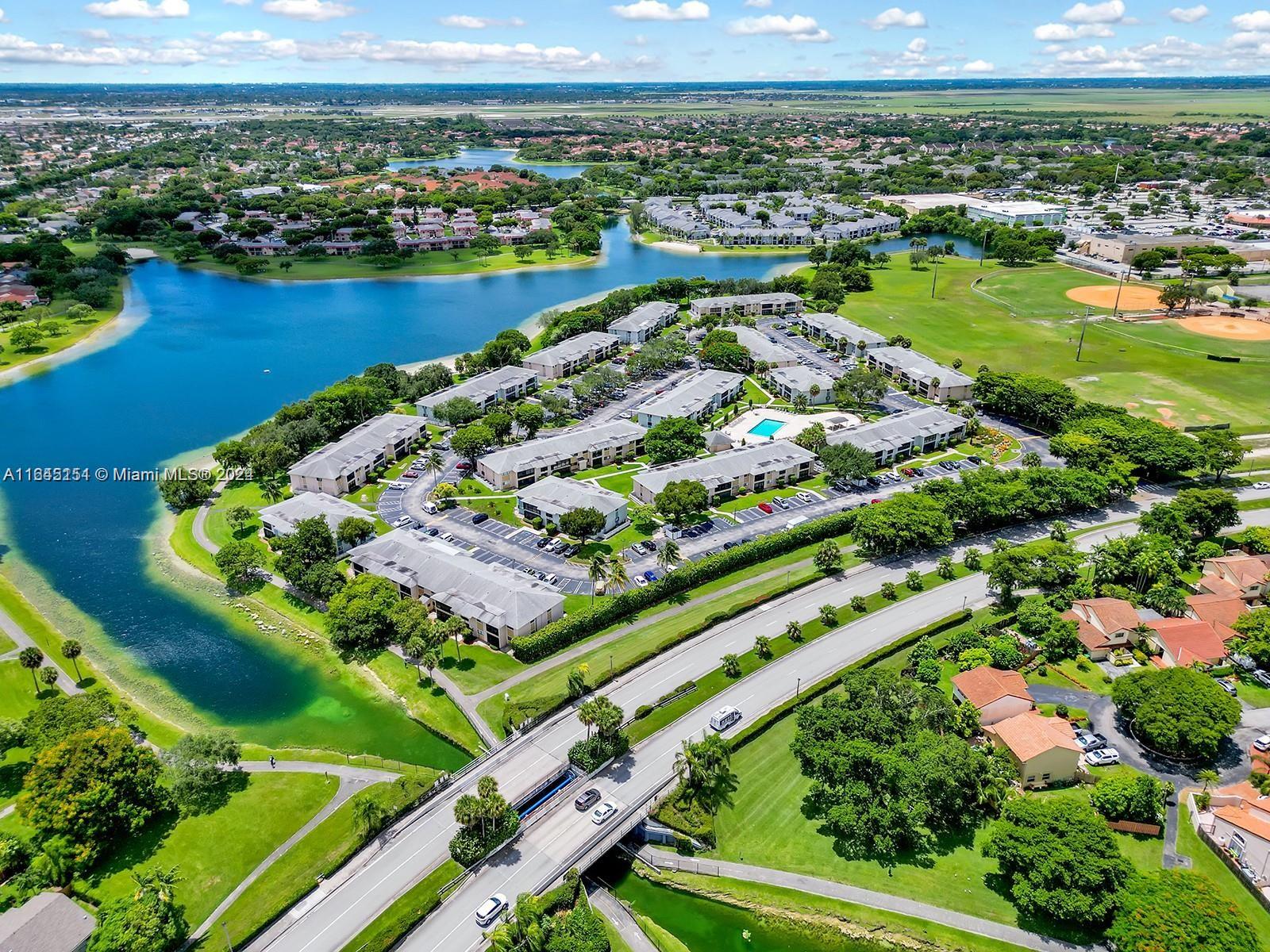 9727 Hammocks Boulevard, Unit 201D Miami, FL 33196 - Photo 20 of 25 a view of a city