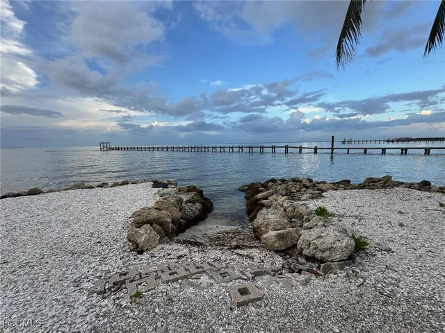 a view of a lake with a beach