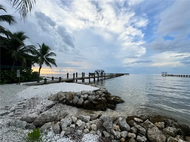 a view of a lake with beach