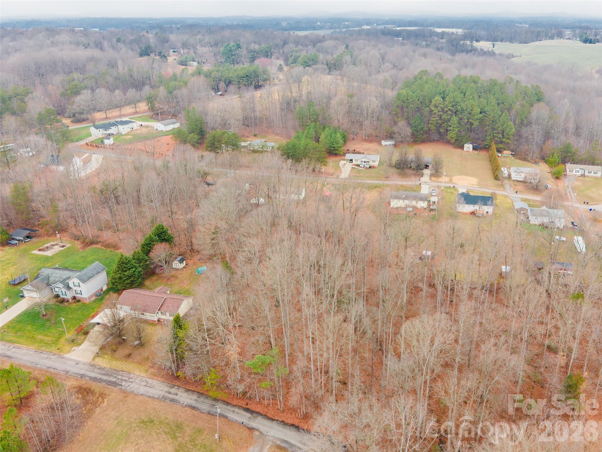139 River Bank Road Statesville, NC 28625 - Photo 4 of 4 a view of a backyard of the house