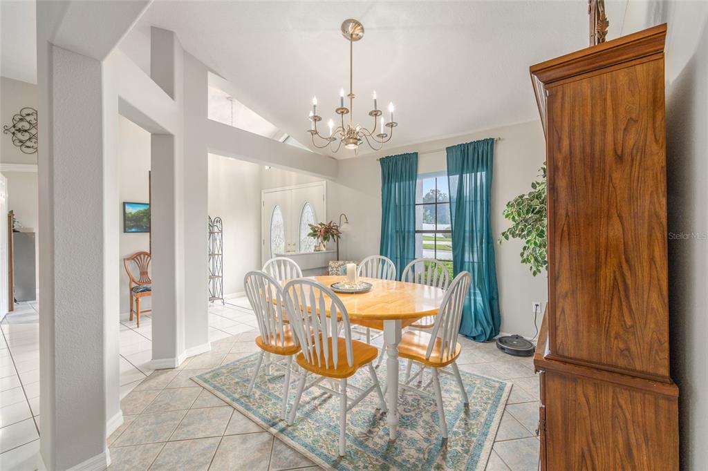 2305 Southeast 30th Street Ocala, FL 34471 - Photo 16 of 66 a view of a dining room with furniture window and outside view