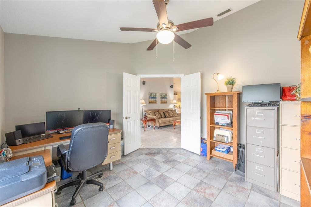 2305 Southeast 30th Street Ocala, FL 34471 - Photo 38 of 66 a view of a workspace with furniture and a window