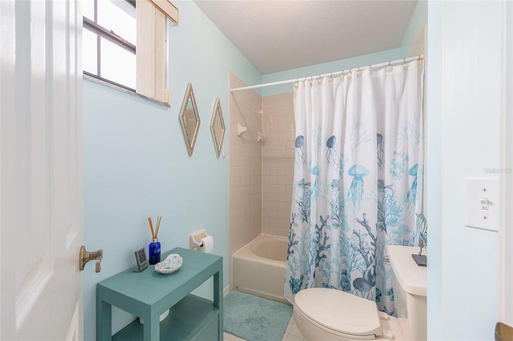 2305 Southeast 30th Street Ocala, FL 34471 - Photo 45 of 66 a bathroom with a sink toilet and shower