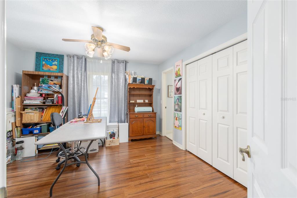 2305 Southeast 30th Street Ocala, FL 34471 - Photo 48 of 66 a view of a livingroom with furniture and wooden floor