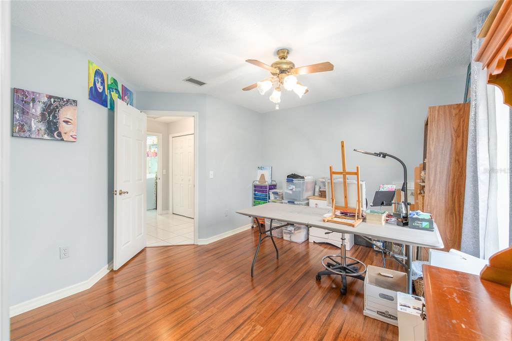 2305 Southeast 30th Street Ocala, FL 34471 - Photo 49 of 66 a view of a workspace with furniture and a window