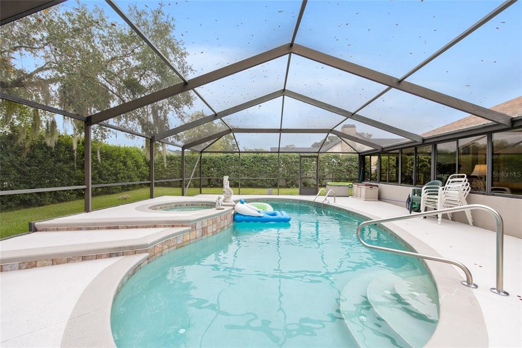 2305 Southeast 30th Street Ocala, FL 34471 - Photo 53 of 66 a view of a swimming pool with a patio