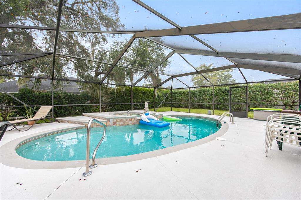 2305 Southeast 30th Street Ocala, FL 34471 - Photo 54 of 66 a view of a swimming pool with a patio