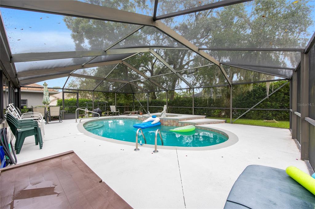 2305 Southeast 30th Street Ocala, FL 34471 - Photo 55 of 66 a view of a swimming pool with a patio