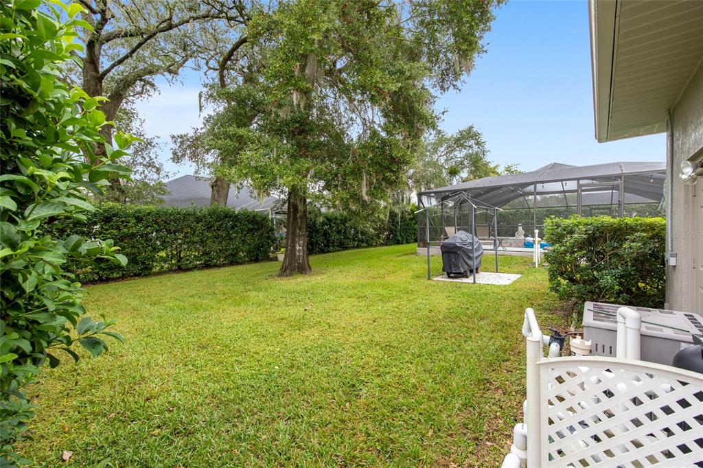 2305 Southeast 30th Street Ocala, FL 34471 - Photo 60 of 66 a view of a backyard with garden