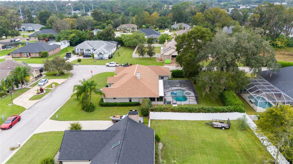 2305 Southeast 30th Street Ocala, FL 34471 - Photo 64 of 66 an aerial view of residential houses with outdoor space and swimming pool
