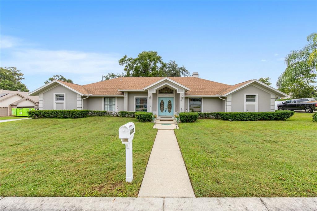 2305 Southeast 30th Street Ocala, FL 34471 - Photo 7 of 66 a front view of house with yard and swimming pool