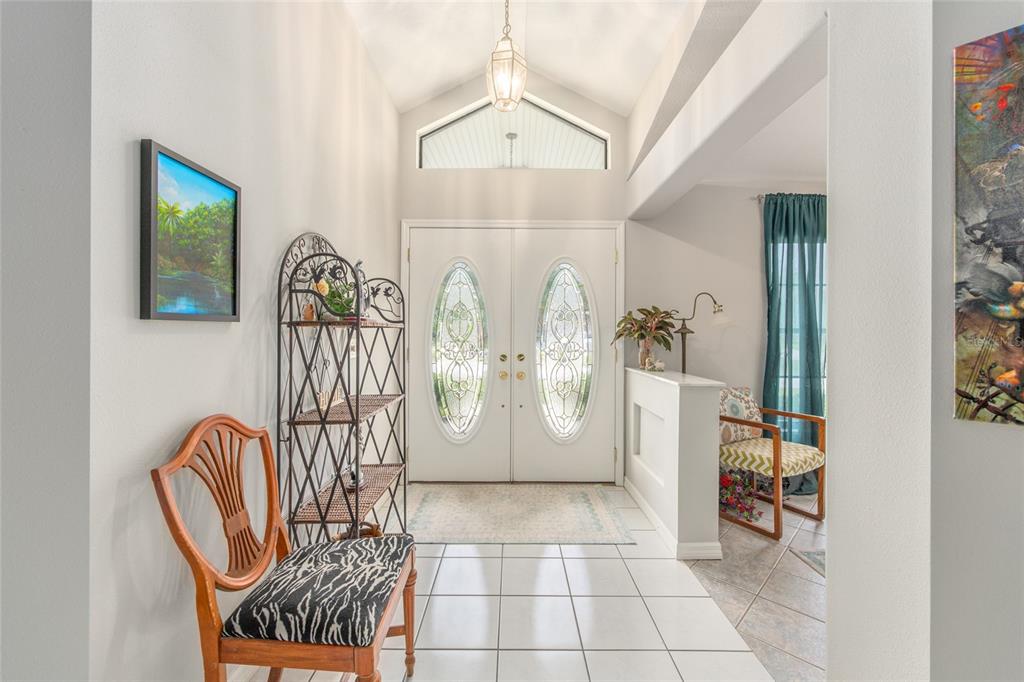 2305 Southeast 30th Street Ocala, FL 34471 - Photo 10 of 66 a view of entryway and hall with a dining table