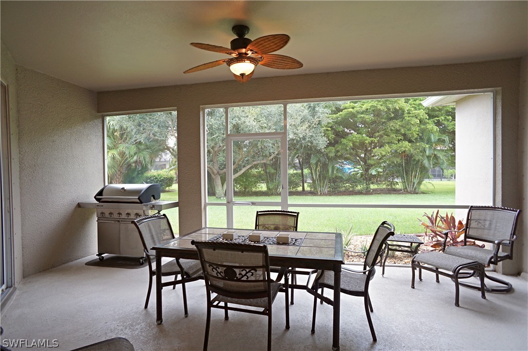 12439 Rock Ridge Lane Fort Myers, FL 33913 - Photo 32 of 35 a view of a dining room with furniture window and outside view