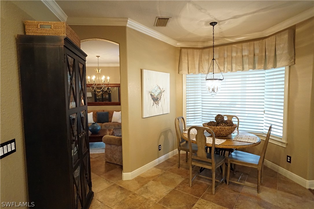 12439 Rock Ridge Lane Fort Myers, FL 33913 - Photo 10 of 35 a dining room with furniture and window