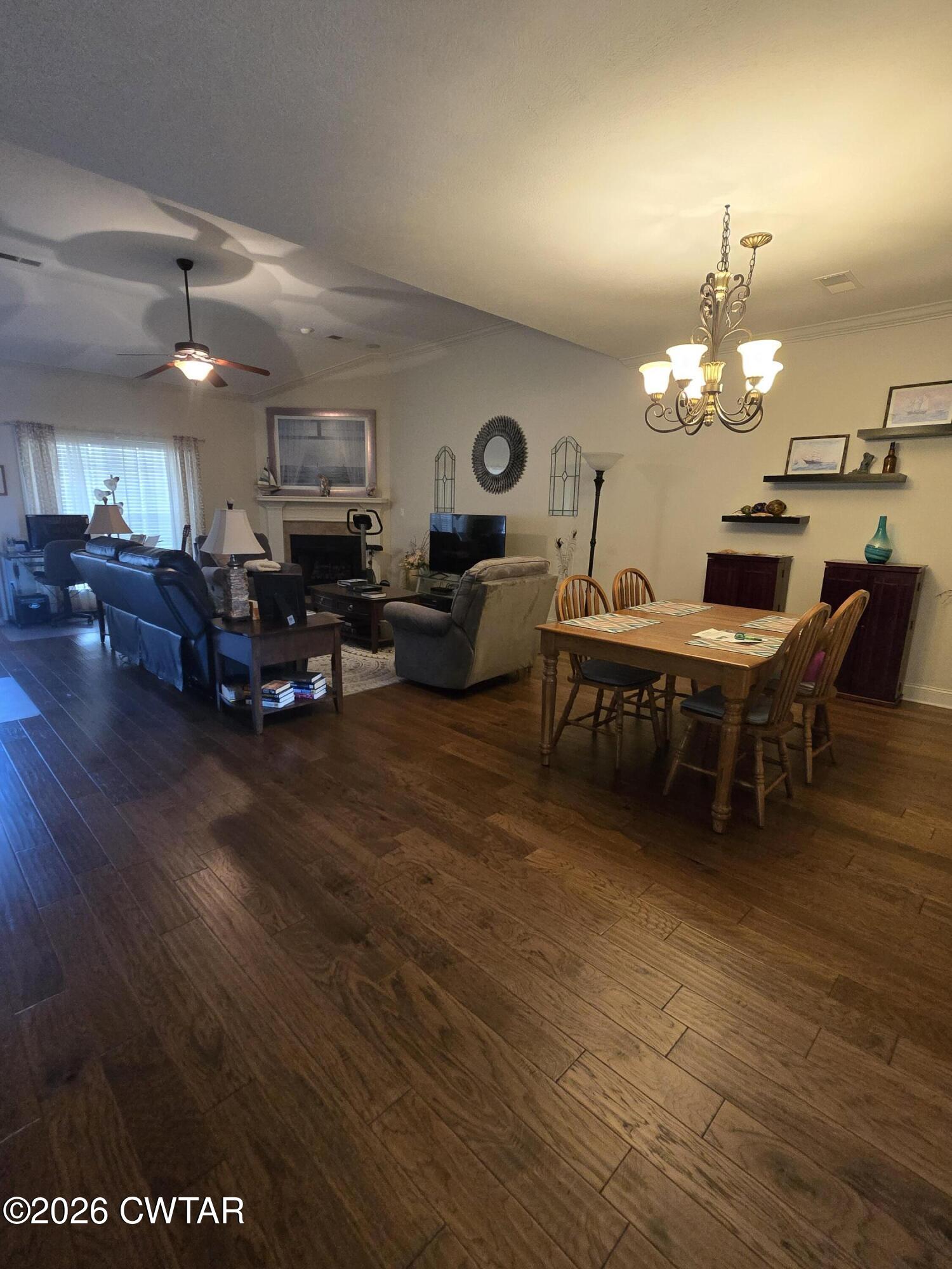 61 Emerald Ridge Cove Jackson, TN 38305 - Photo 7 of 24 a living room with furniture and a chandelier
