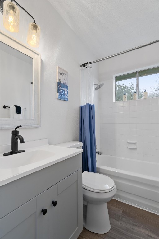 405 East Logan Street Round Rock, TX 78664 - Photo 20 of 23 a bathroom with a sink a toilet and shower
