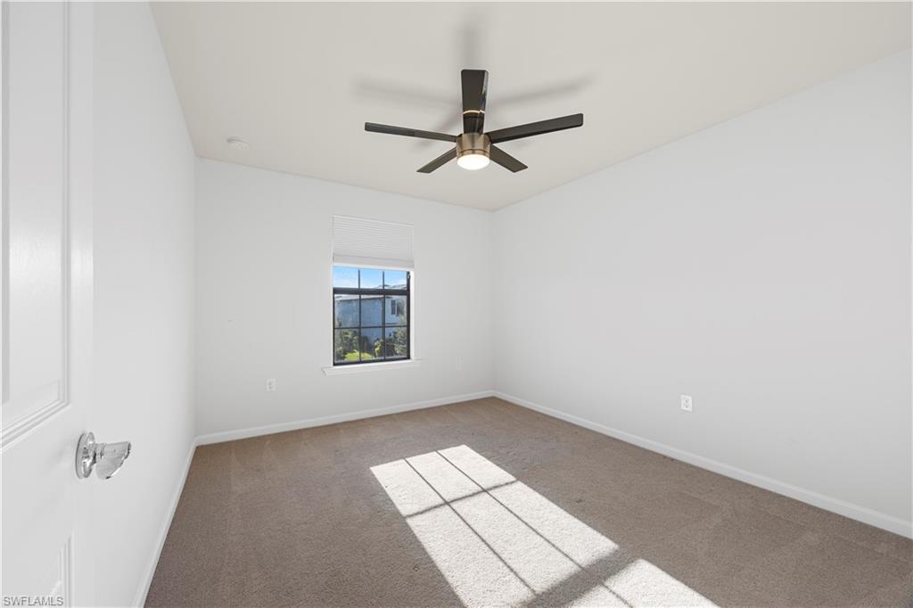 4583 Lamaida Lane Immokalee, FL 34142 - Photo 23 of 29 an empty room with a window