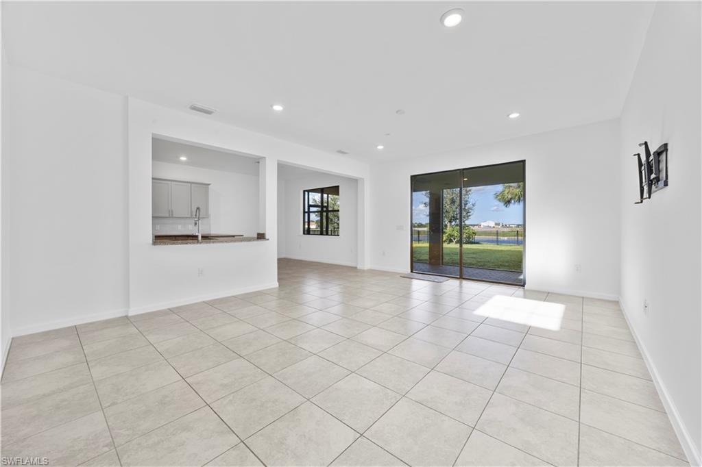 4583 Lamaida Lane Immokalee, FL 34142 - Photo 5 of 29 a view of an empty room with a window