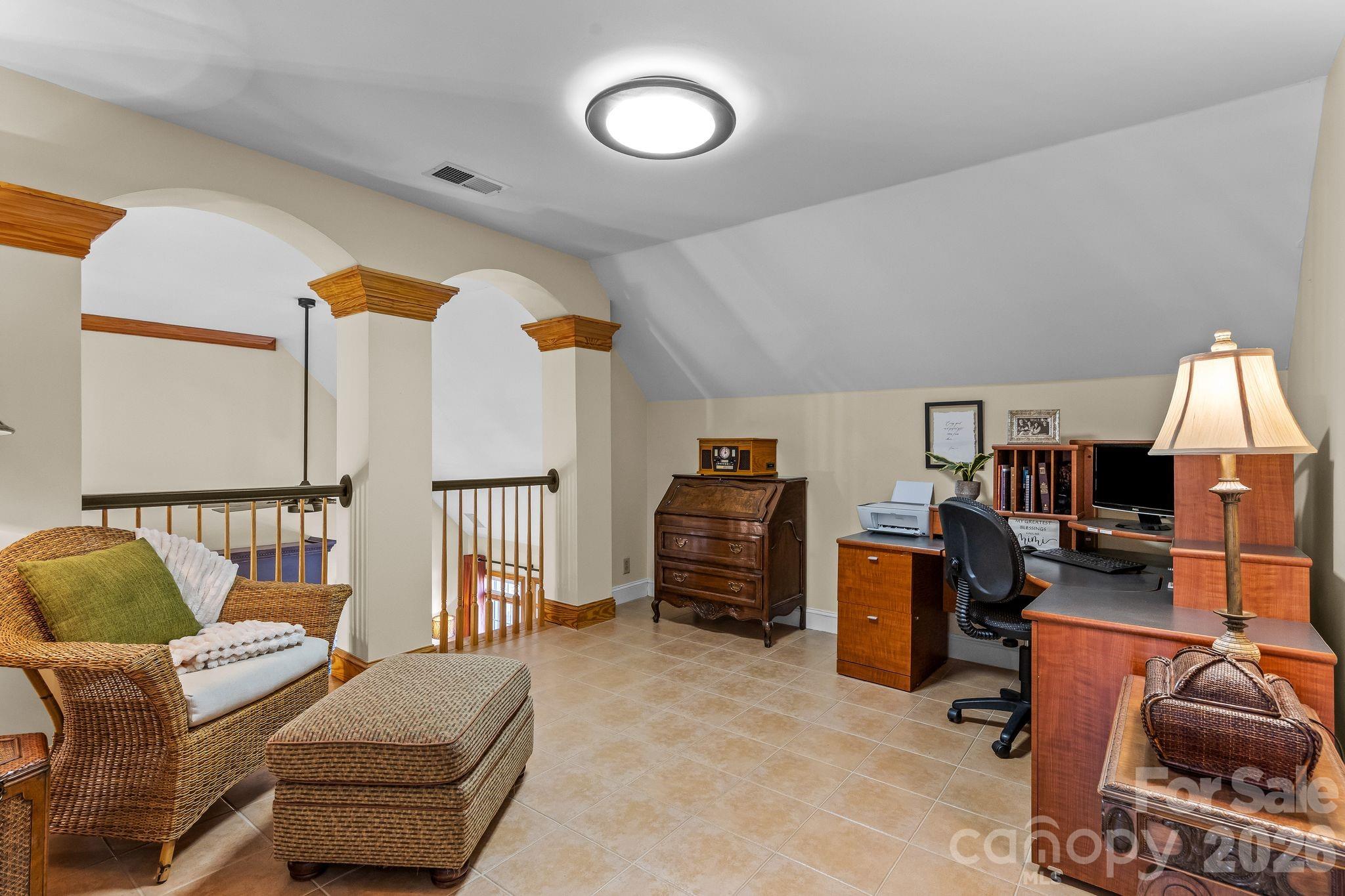 3530 Cardiff Lane Matthews, NC 28104 - Photo 28 of 39 a bedroom with furniture and a window