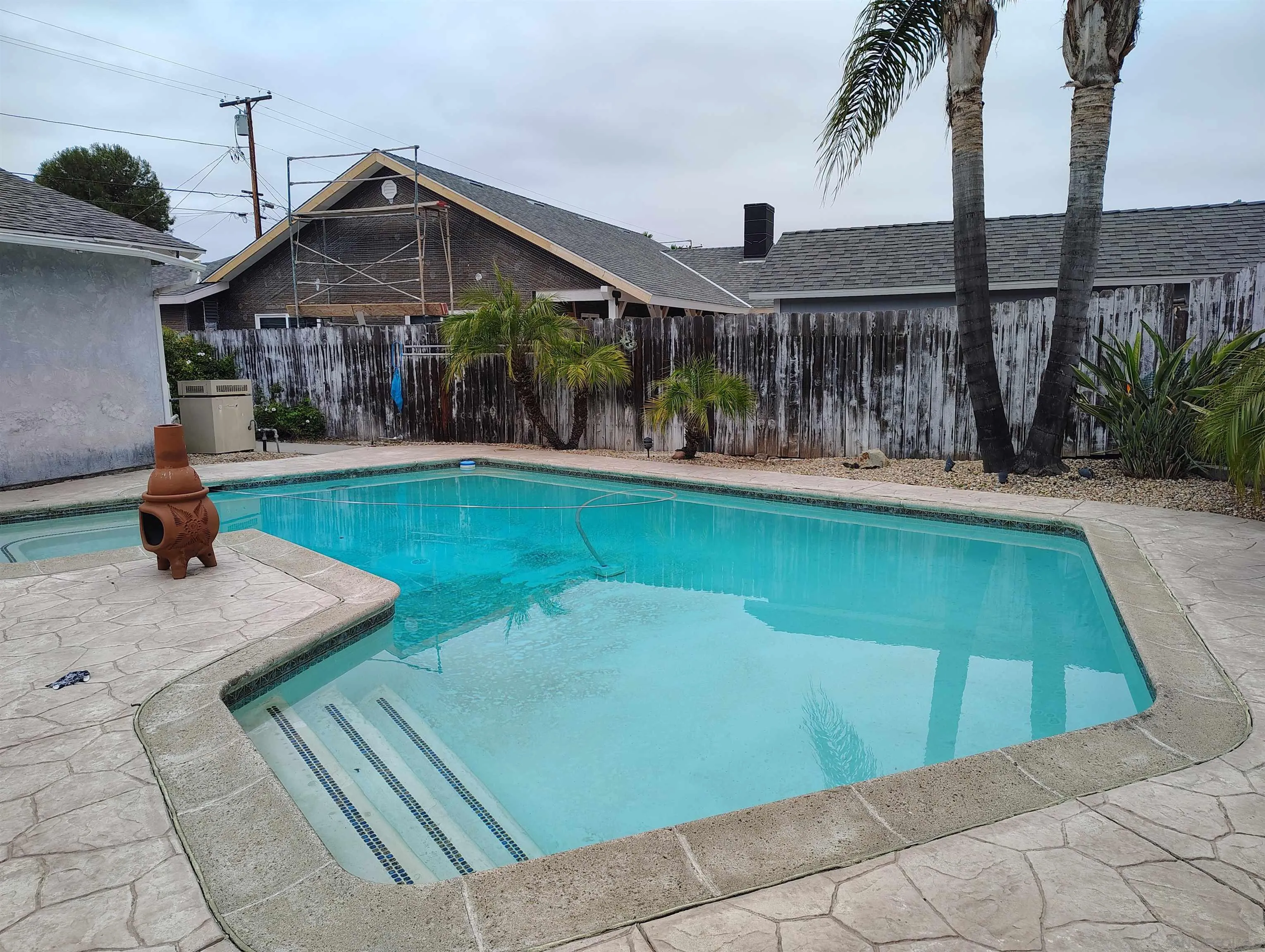 14155 Frame Road Poway, CA 92064 - Photo 3 of 4 a view of a house with a yard patio and swimming pool