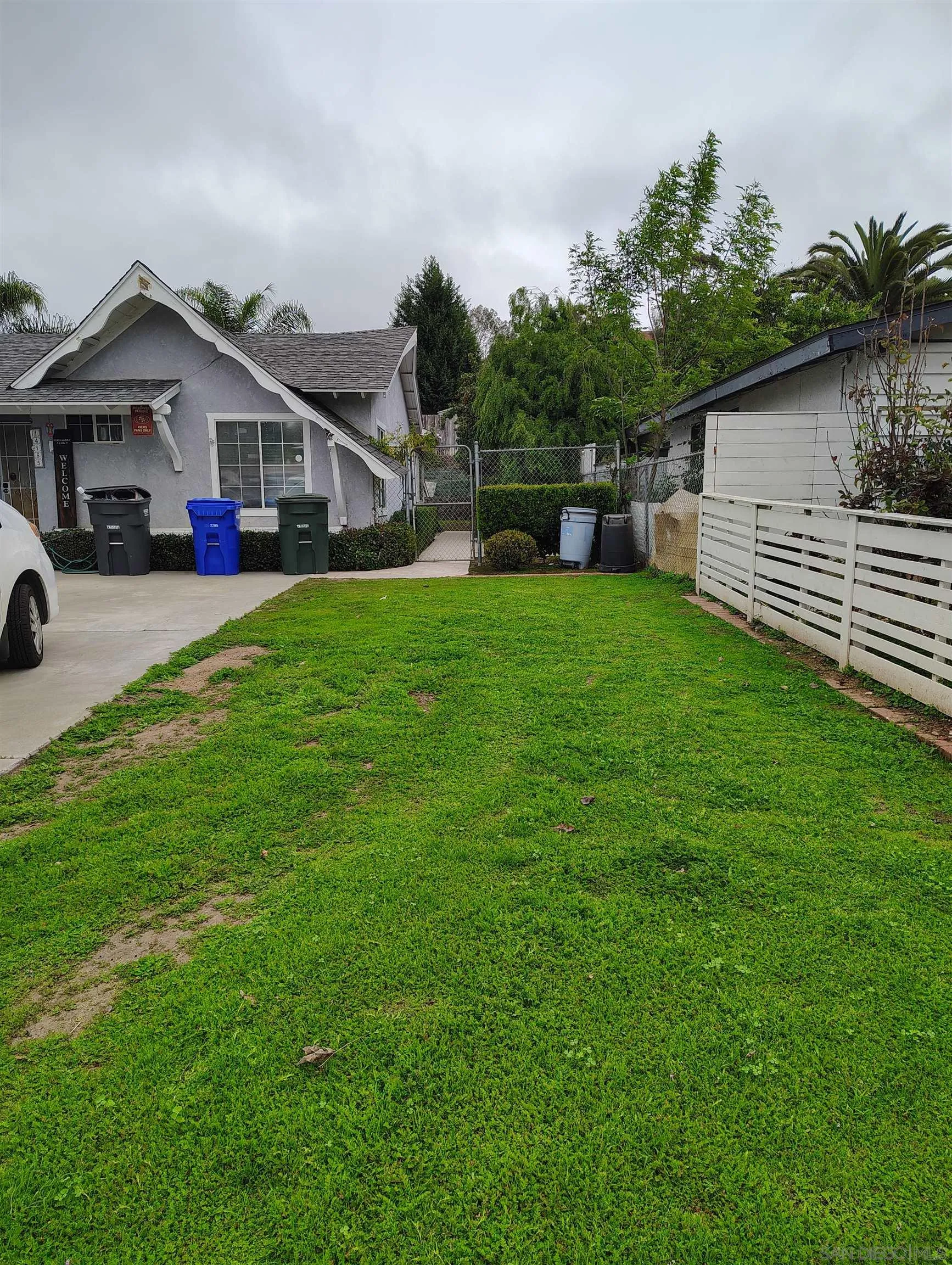 14155 Frame Road Poway, CA 92064 - Photo 4 of 4 a front view of a house with garden