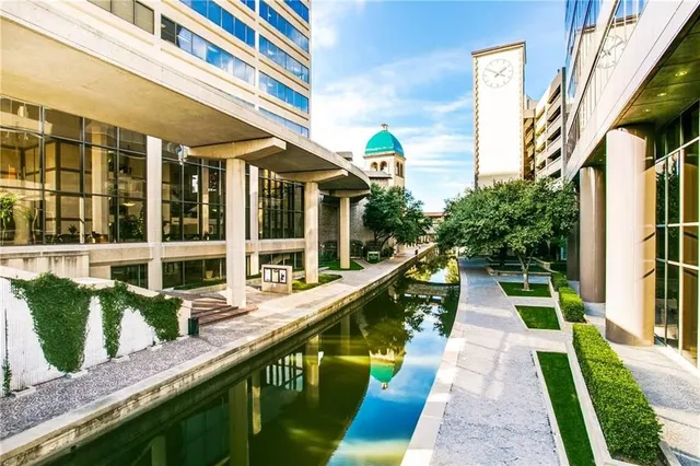 a house with swimming pool in front of it