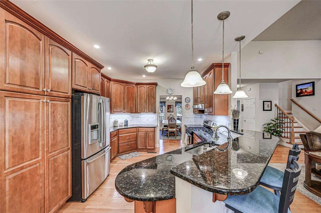 112 Michaels Run Road Stroudsburg, PA 18360 - Photo 22 of 69 The Kitchen features granite countertops and features tiered bar-height seating for 3-4 people.