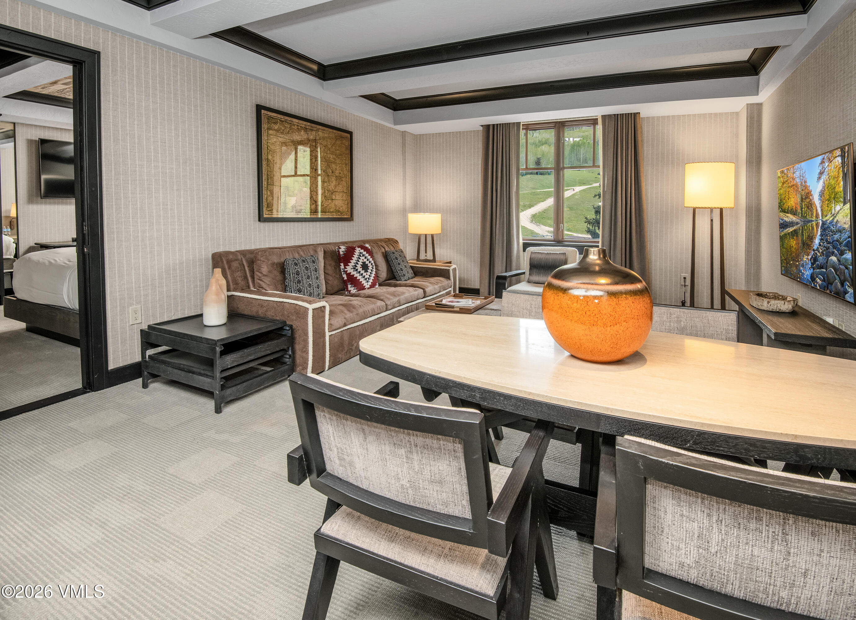 130 Daybreak Ridge Road, Unit HS716 Avon, CO 81620 - Photo 3 of 25 a living room with furniture and a potted plant
