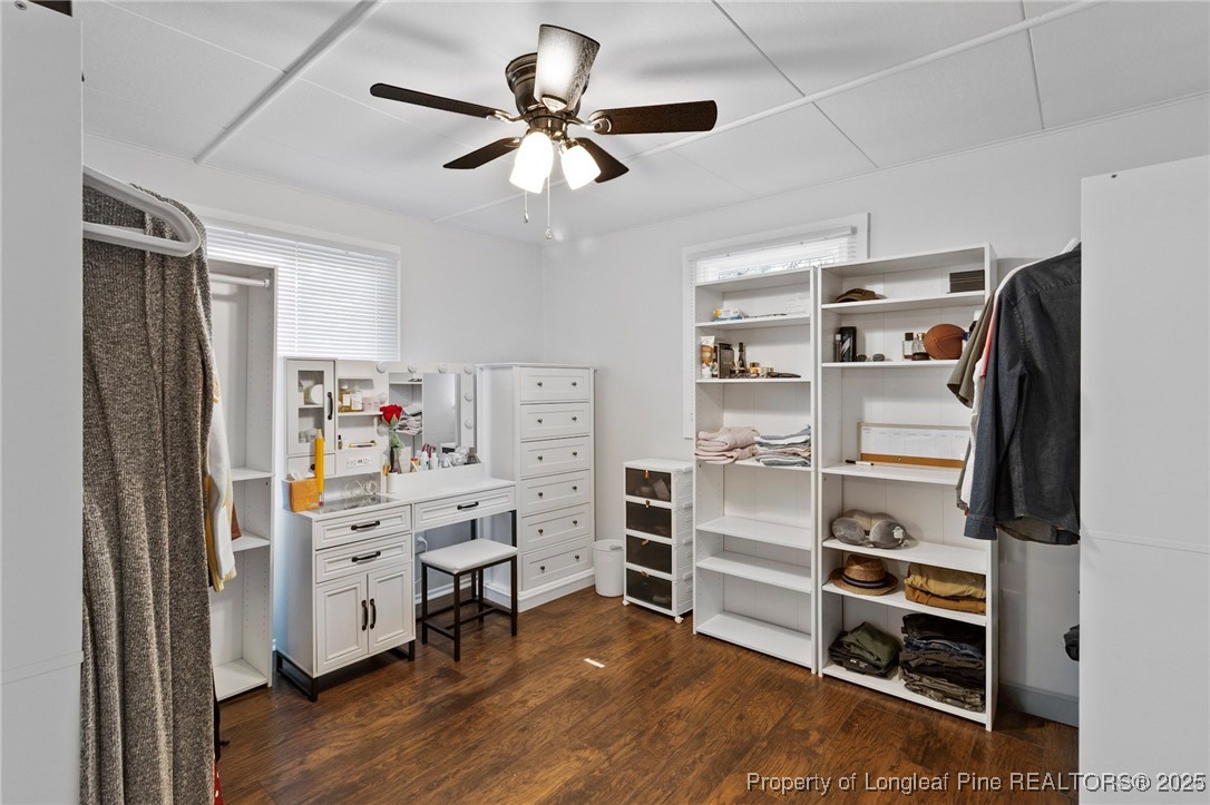 4112 Legion Road Hope Mills, NC 28348 - Photo 13 of 22 a view of walk in closet with empty racks