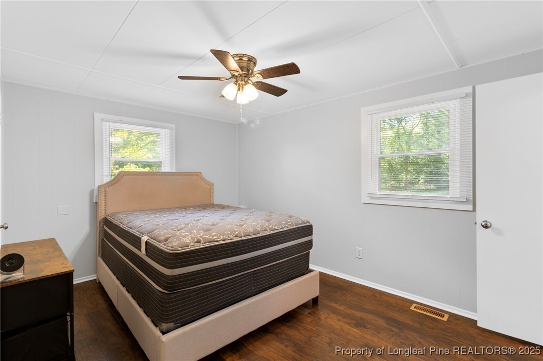 4112 Legion Road Hope Mills, NC 28348 - Photo 18 of 22 a room that has a bed and a window