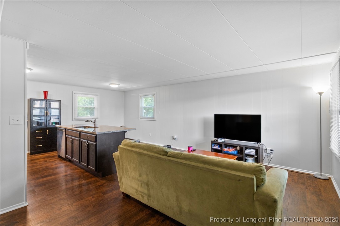 4112 Legion Road Hope Mills, NC 28348 - Photo 5 of 22 a living room with furniture and a flat screen tv