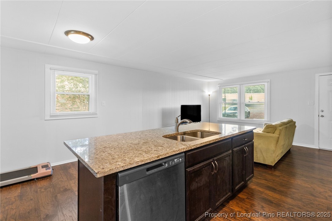 4112 Legion Road Hope Mills, NC 28348 - Photo 8 of 22 a view of a kitchen with granite countertop and sink