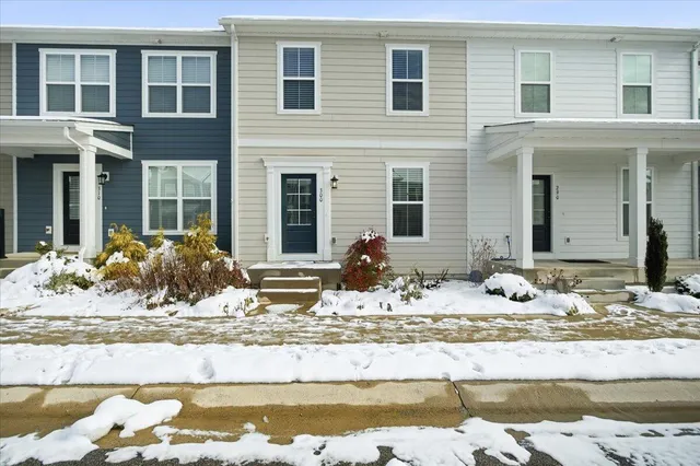 a view of a dinning table and chair in the patio